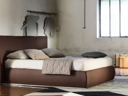 Letto in ecopelle con box contenitore e importante testiera Giselle Plain di Ergogreen