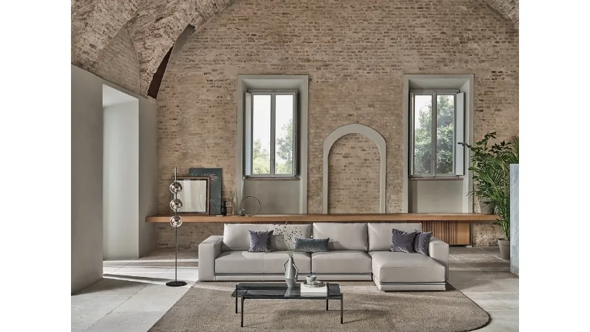 Divano in ecopelle con penisola Pitagora di Bontempi